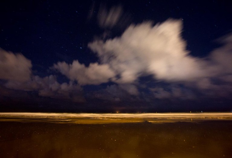 Photo of the North Sea beach at night, Ostend, Belgium